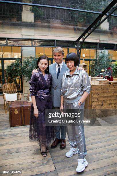 Dong Jie, Brunello Cucinelli and Angelica Cheung are seen at the Brunello Cucinelli presentation during Milan Fashion Week Spring/Summer 2019 on...