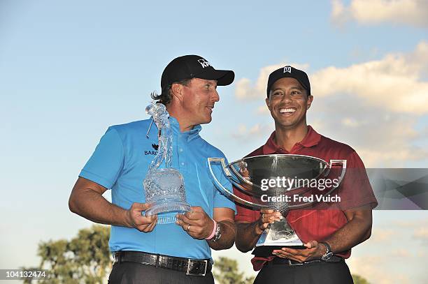 Tour Championship: Phil Mickelson victorious with Tour Championship trophy and Tiger Woods victorious with FedEx Cup trophy after Sunday play at East...