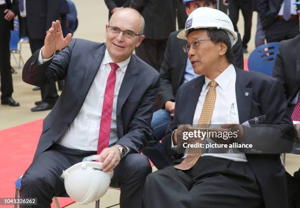 Mecklenburg-Western Pomerani Prime Minister Erwin Sellering can be seen with head of the Genting Group, Tan Sri Lim Kok Thay. At the keel laying of...
