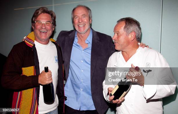 Kurt Russell, Greg Gorman, and Wolfgang Puck pose at the opening night reception of "Greg Gorman: A Distinctive Vision 1970-2010" at Pacific Design...