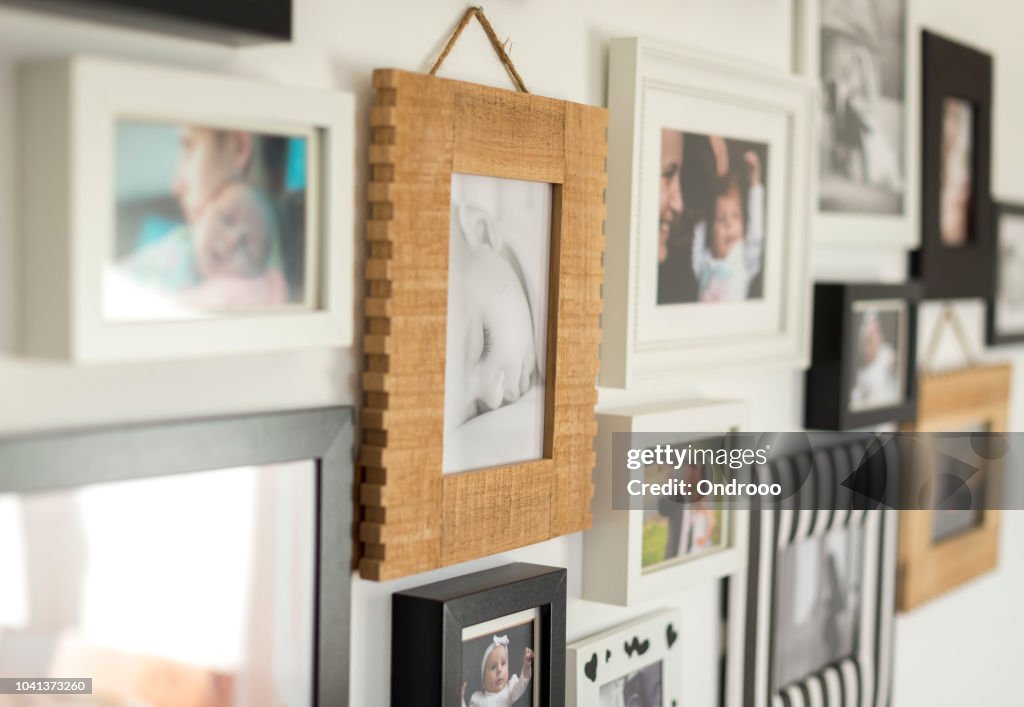 Photos of the family in various photo frames