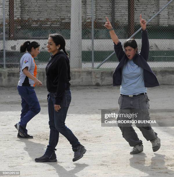 "Saltamontes de Venus" female football team players train on a field at Floresta neighborhood in Quito, September 15, 2010. An Equadorean jugde...