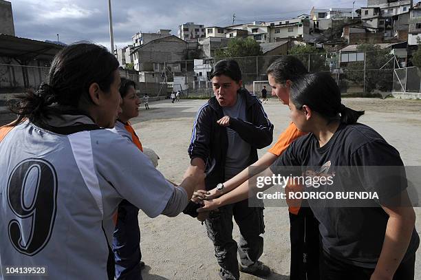 "Saltamontes de Venus" female football team players train on a field at Floresta neighborhood in Quito, September 15, 2010. An Equadorean jugde...