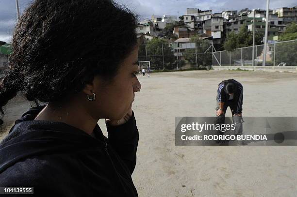 "Saltamontes de Venus" female football team players train on a field at Floresta neighborhood in Quito, September 15, 2010. An Equadorean jugde...