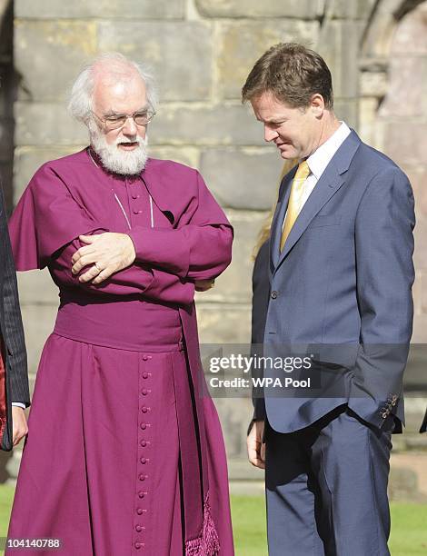 Archbishop of Canterbury Rowan Williams talks with Deputy PM Nick Clegg in the gardens at the Palace of Holyroodhouse during day one of his four day...