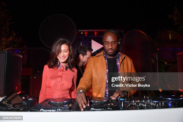 Bella Hadid and Virgil Abloh attend the YouTube cocktail party during Paris Fashion Week on September 26, 2018 in Paris, France.