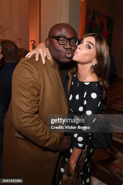 Edward Enninful and Carine Roitfeld attend the YouTube cocktail party during Paris Fashion Week on September 26, 2018 in Paris, France.