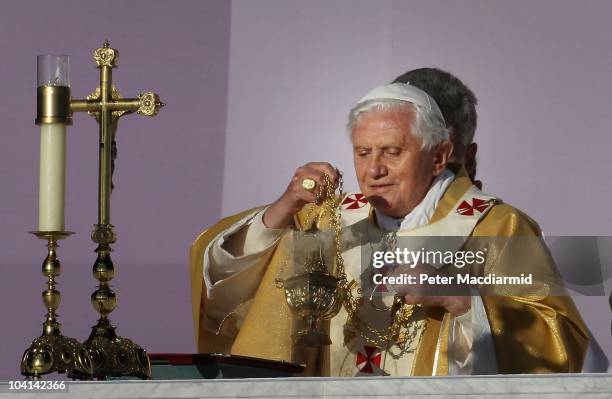 Pope Benedict XVI conducts Mass at Bellahouston Park on September 16, 2010 in Glasgow, Scotland. Pope Benedict XVI is conducting the first state...