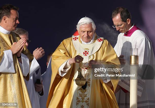 Pope Benedict XVI conducts Mass at Bellahouston Park on September 16, 2010 in Glasgow, Scotland. Pope Benedict XVI is conducting the first state...