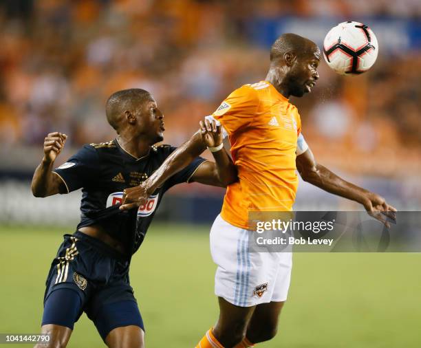 DaMarcus Beasley of Houston Dynamo heads the ball away from Fafa Picault of Philadelphia Union in the first half during the 2018 Lamar Hunt U.S. Open...