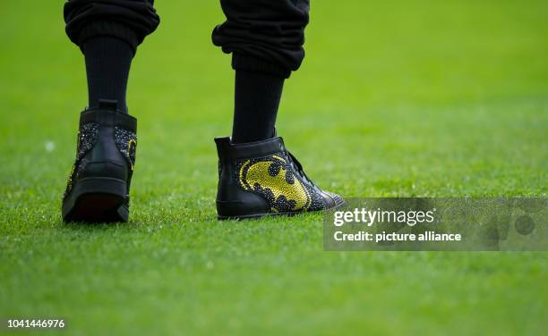 The distinctive boots of Dortmund's Pierre-Emerick Aubameyang featuring a Batman logo at the German Bundesliga soccer match between Borussia Dortmund...