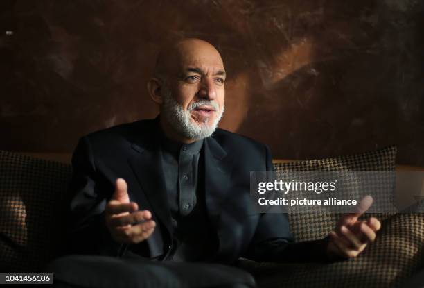 The former Afghan President, Hamid Karsai, speaks in an interview with the German Press-Agency at the Arcadia Grand Hotel in Dortmund, Germany, 9...