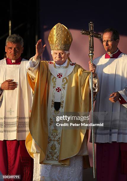 Pope Benedict XVI waves after conducting Mass at Bellahouston Park on September 16, 2010 in Glasgow, Scotland. Pope Benedict XVI is conducting the...