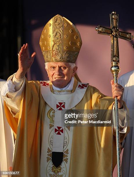 Pope Benedict XVI waves after conducting Mass at Bellahouston Park on September 16, 2010 in Glasgow, Scotland. Pope Benedict XVI is conducting the...