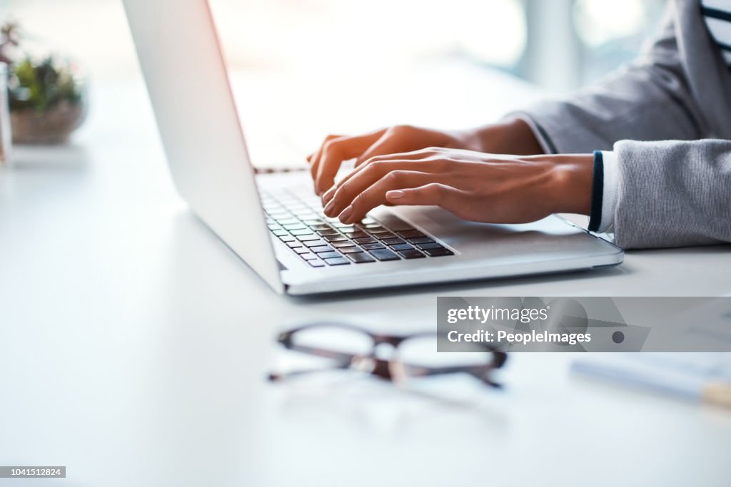 Typed Work Typing Her Way To A Productive Work Day High-Res Stock Photo - Getty Images