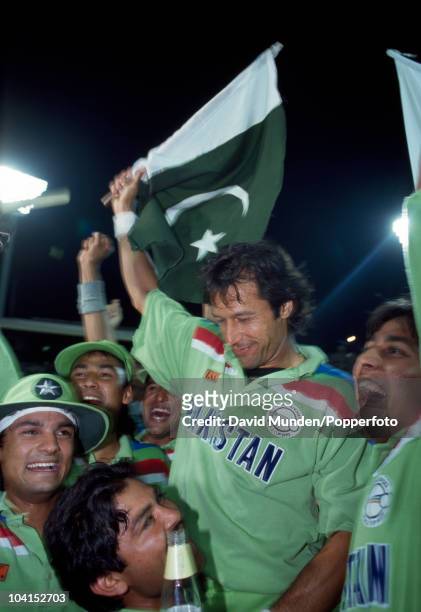 Pakistan captain Imran Khan celebrates with his team after the World Cup Final between Pakistan and England at the Melbourne Cricket Ground, 25th...