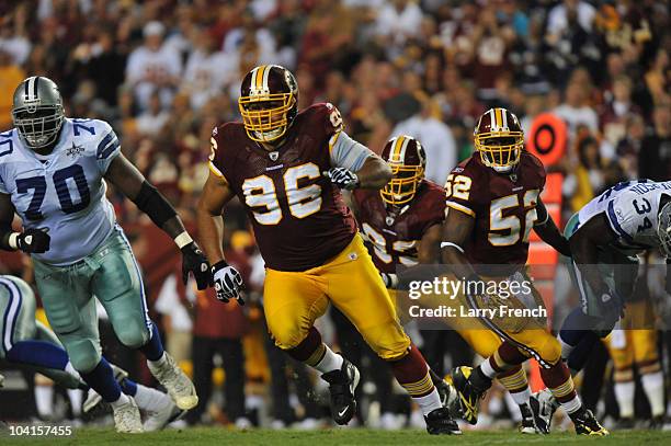 Maake Kemoeatu of the Washington Redskins defends during the NFL season opener against the Dallas Cowboys at FedExField on September 12, 2010 in...