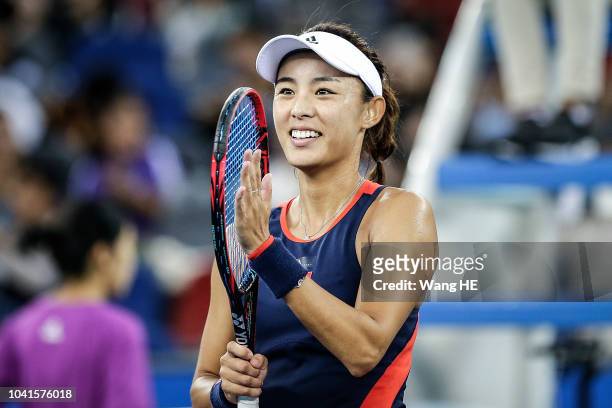Qiang Wang of China celebration winning against Monica Puig of Puerto Rico during 2018 Wuhan Open at Optics Valley International Tennis Center on...