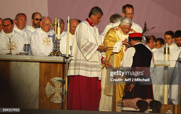 Pope Benedict XVI conducts the Papal Mass at Bellahouston Park on September 16, 2010 in Glasgow, Scotland. Pope Benedict XVI is conducting the first...