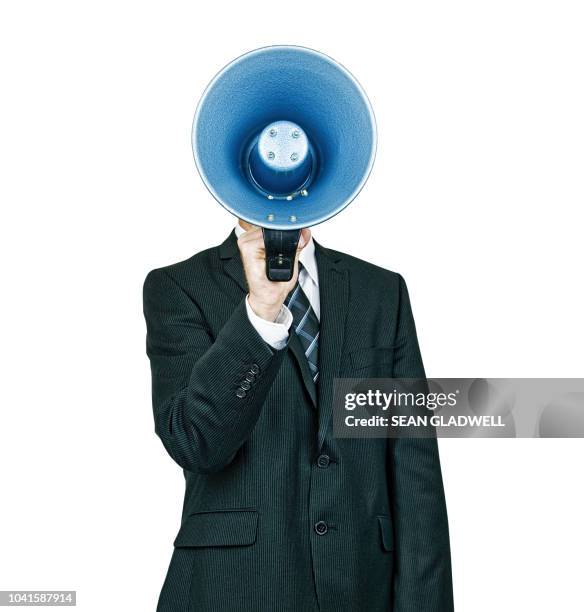 businessman holding megaphone in front of face - bossy ストックフォトと画像