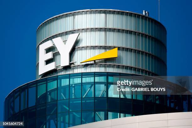 Picture shows the logo of EY , a multinational professional services firm, in Madrid on September 27, 2018.