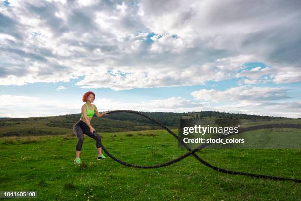 Using Battle Ropes Outside 542 Battle Ropes Outside Stock Photos, High-Res Pictures, and Images ...