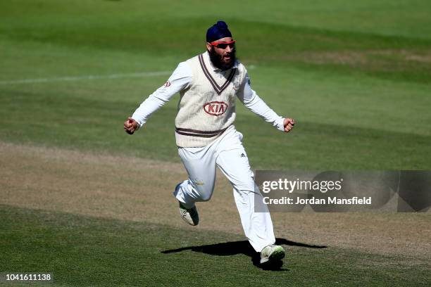 Amar Viridi of Surrey celebrates dismissing Nick Browne of Essex during day three of the Specsavers County Championship Division One match between...