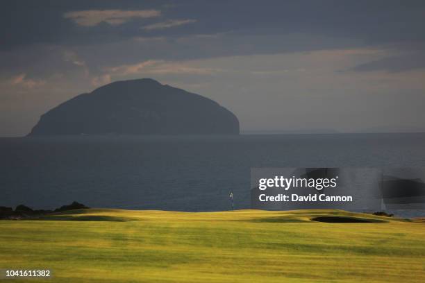 The approach to the green on the par 5, eighth hole with the island of Ailsa Criag in the distance behind on the King Robert the Bruce Course at the...