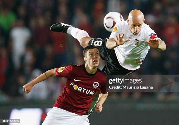 Giulio Migliacco of US Citta' di Palermo is challenged by Vaclav Kadlec of AC Sparta Prague during the Uefa Europa League Group F match between...