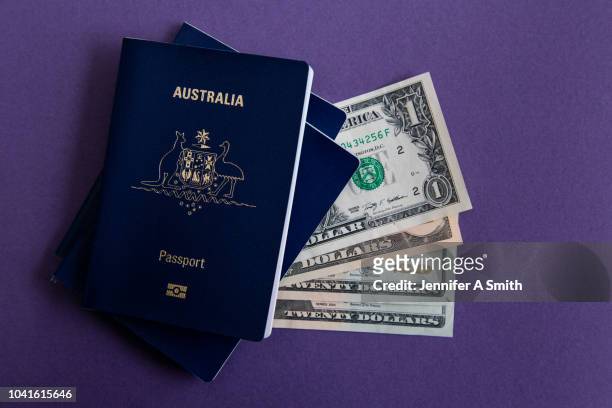 australian passports and us currency - australian passport bildbanksfoton och bilder