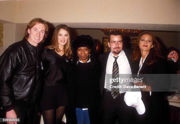 Wayne Gretzky, Brooke Shields, Whoopi Goldberg, Charlie Sheen and wife Donna Peele attend the official grand opening of the All Star Cafe in Times...