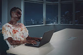 Male zombie overworking in the office