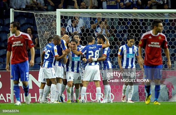 Porto´s players celebrate after scoring against Rapid Vienna during their UEFA Europa League football match at the Dragao Stadium in Porto, on...