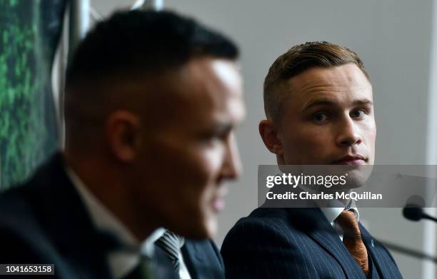 Josh Warrington and Carl Frampton react to questions from the floor during a press conference at the Clayton hotel on September 27, 2018 in Belfast,...