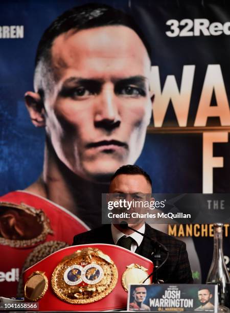 Boxer Josh Warrington speaks during a press conference at the Clayton hotel on September 27, 2018 in Belfast, Northern Ireland. Josh Warrington will...