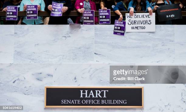 Protesters opposed to the confirmation of Brett Kavanaugh gather in the Hart Senate Office Building in support of Dr. Christine Blasey Ford before...
