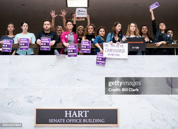 Protesters opposed to the confirmation of Brett Kavanaugh gather in the Hart Senate Office Building in support of Dr. Christine Blasey Ford before...