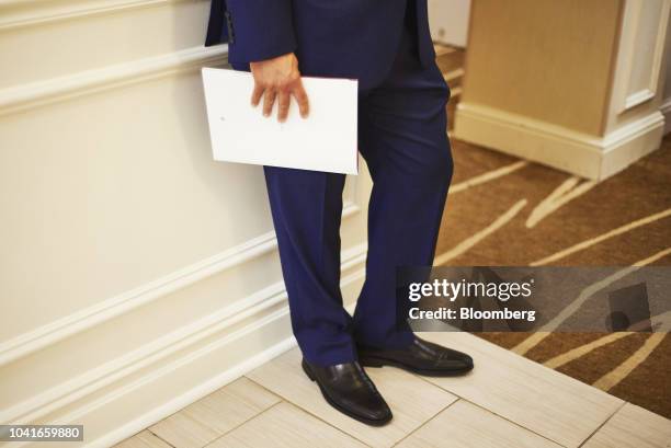 Job seeker holds a resume a during a National Career Fair event in Edison, New Jersey, U.S., on Thursday, Sept. 20, 2018. Filings for U.S....