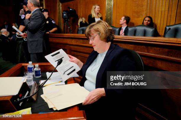 Republican prosecutor Rachel Mitchell, who will be questioning Kavanaugh accuser Christine Blasey Ford, prepares prior to a Senate Judiciary...