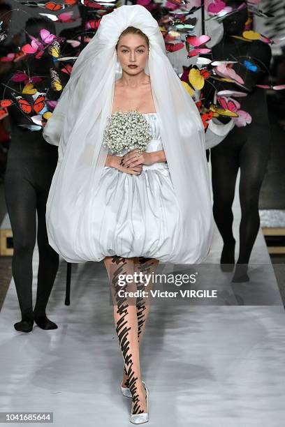 Gigi Hadid walks the runway at the Moschino Ready to Wear fashion show during Milan Fashion Week Spring/Summer 2019 on September 20, 2018 in Milan,...