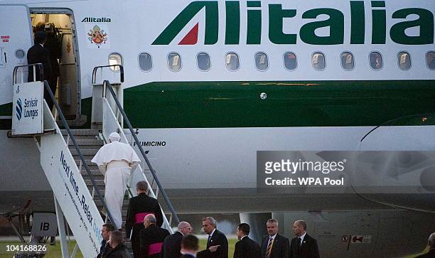 Pope Benedict XVI boards his plane as he heads to London during his four day state visit to the United Kingdom on September 16, 2010 in Glasgow,...