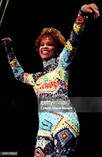 Whitney Houston performs in concert at Wembley Arena on September 10, 1991 in London, England.