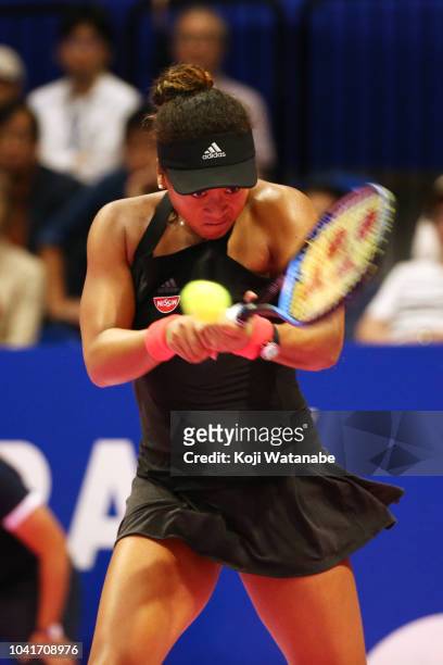 Naomi Osaka of Japan plays a backhand in the Singles quarter final against Barbora Strycova of the Czech Republic on day five of the Toray Pan...