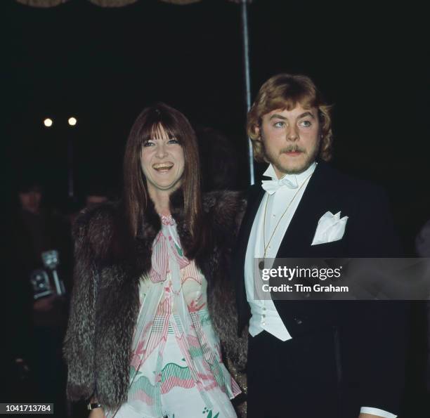 Welsh actor Hywel Bennett and his wife, broadcaster Cathy McGowan arrive at the Odeon Leicester Square in London for the premiere of the film 'Anne...