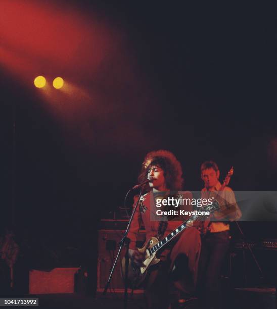 Singer Marc Bolan and guitarist Steve Currie of glam rock band T. Rex perform at the Lyceum in London, February 1976.