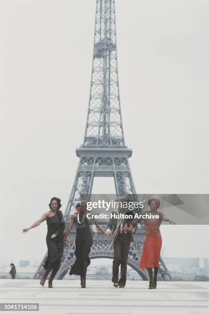 From left to right, Marcia Barrett, Maizie Williams, Bobby Farrell and Liz Mitchell of vocal group Boney M., in front of the Eiffel Tower in Paris,...