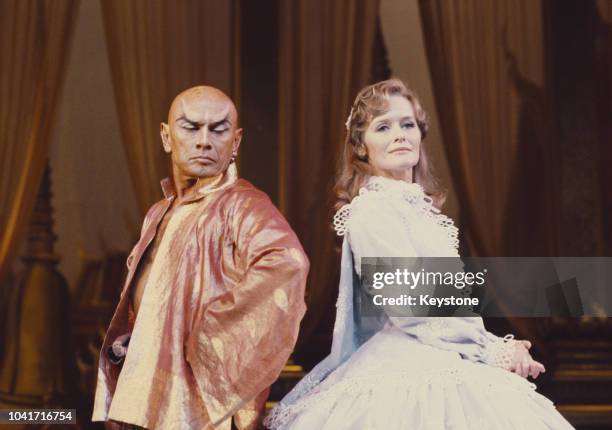 Actors Yul Brynner and Virginia McKenna star in the stage version of the musical 'The King And I' at the London Palladium, UK, 1979.