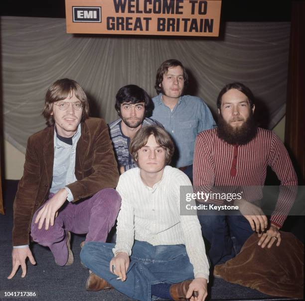 American rock band The Box Tops sitting beneath an EMI sign which reads 'Welcome to Great Britain', UK, 4th December 1969. Singer Alex Chilton is in...