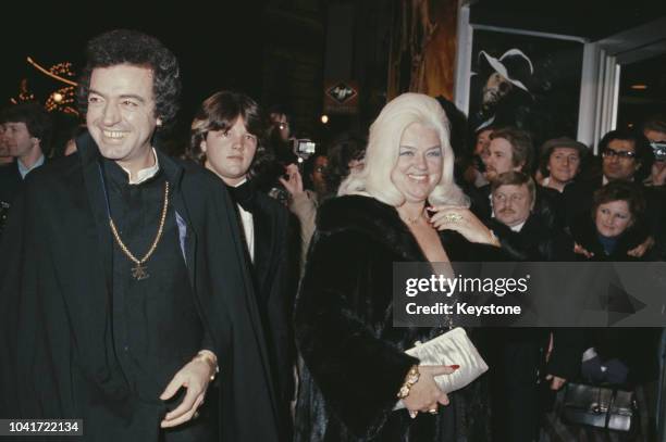 English actress Diana Dors , her husband Alan Lake and their son Jason attend a screening of the television film 'Freedom Road', London, UK, 1980.