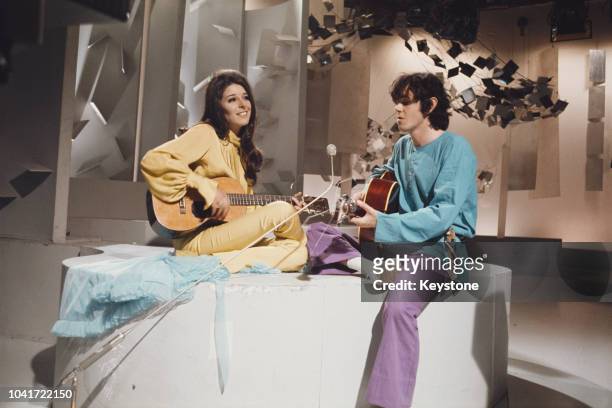 Scottish singer Donovan performs the song 'There Is A Mountain' with American singer Bobbie Gentry, on the 'Bobbie Gentry Show', UK, 1968.